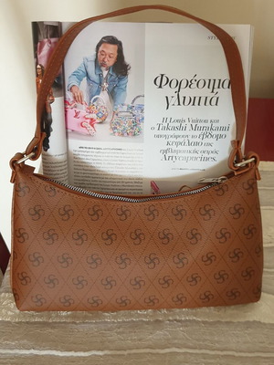 Brown shoulder bag with unique pattern like new