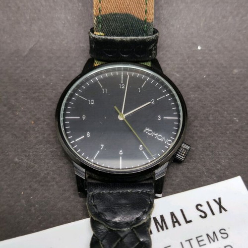 Komono watch used with leather and fabric military strap