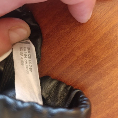 H&M synthetic leather skirt adjustable waist, like new, black, ages 7-8