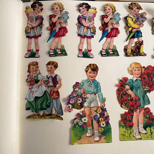 Vintage embossed paper figures used, set of 9 from the 1960s