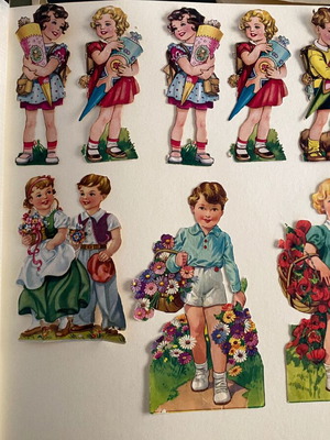 Vintage embossed paper figures used, set of 9 from the 1960s