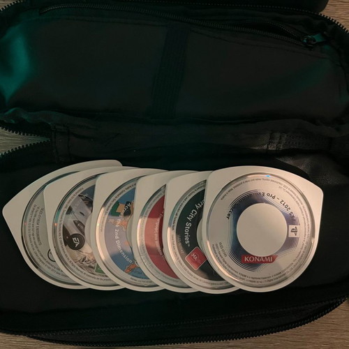 PlayStation Portable PSP-E 1004 μεταχειρισμένο με φορτιστή, 5 παιχνίδια και Urban θήκη