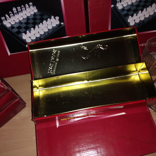Johnnie Walker collectible set new with chess, whiskey glasses, and metal box