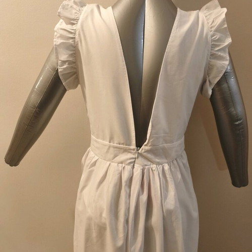 Women's white dress used with open back and nice fit