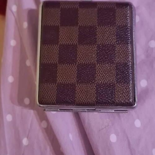 Tobacco case with lighter like new