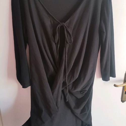 Black blouse one size like new with cord and unique design