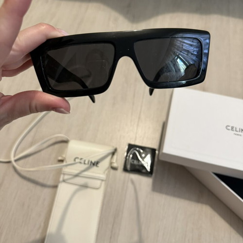 Celine sunglasses used with minor scratches, black