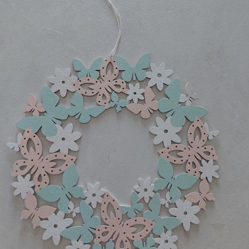 Decorative wreath made of wood with butterflies and flowers, new