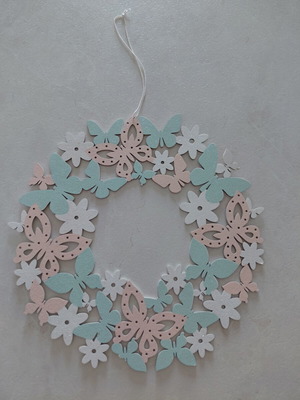 Decorative wreath made of wood with butterflies and flowers, new
