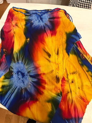 Beach pareo, swimsuits and shorts used, set of 9 multicolor