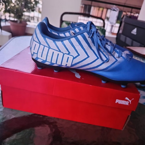 Puma football shoes FG used, size 43, white and blue