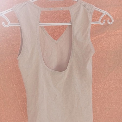 Esti beige top used with back opening, size S