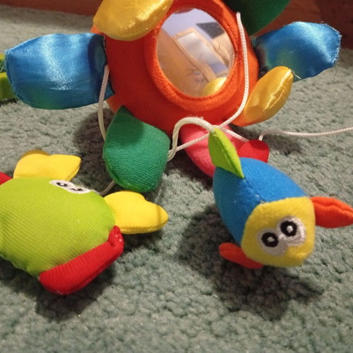 Hanging octopus baby toy used with mirror and sound animals