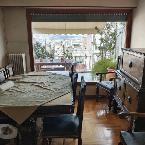 Old table with chairs and other furniture like new