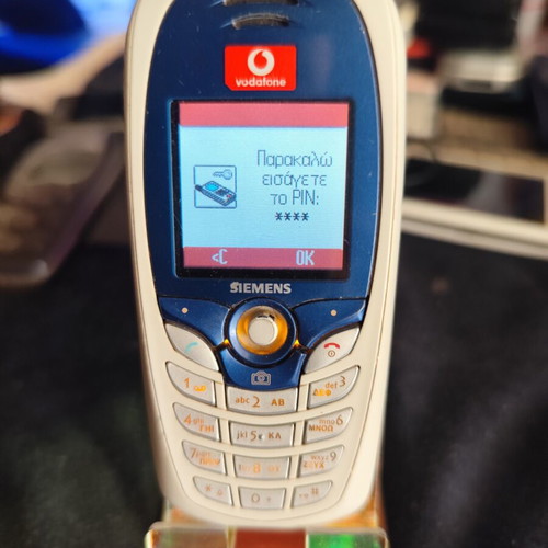 Siemens C65 mobile phone used, some keys not working, no charger