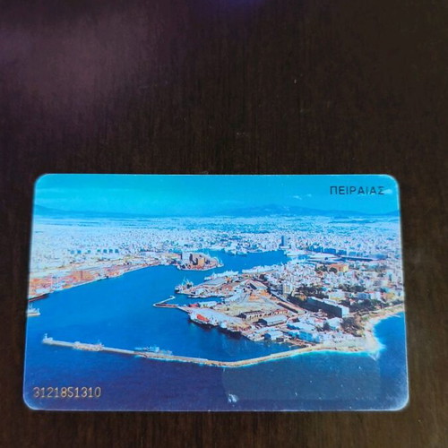 Greek phone card used, left writing