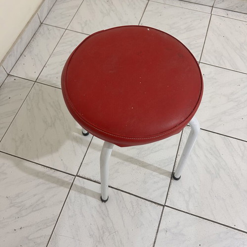 Stool with metal legs and red seat like new