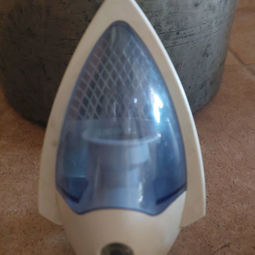 White plug-in night light like new