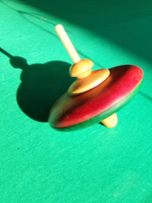 Wooden spinning top used, Scandinavian style, dense wood