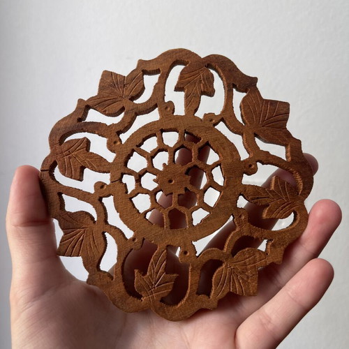 Vintage wooden coaster set 6 pieces with carved design and holder