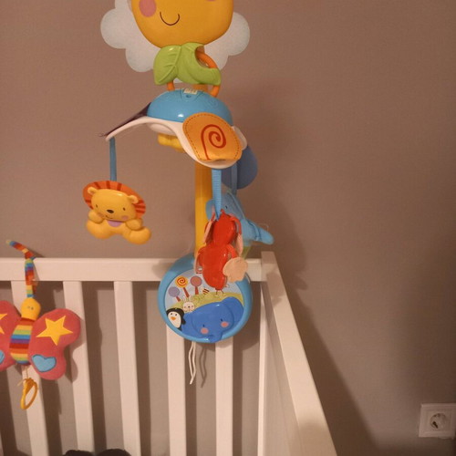 Fisher Price musical rotating mobile used with wind-up mechanism