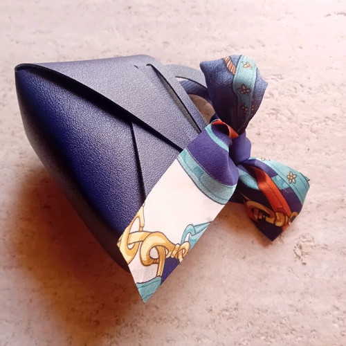 Gift packaging bag made of artificial leather new, blue with ribbon