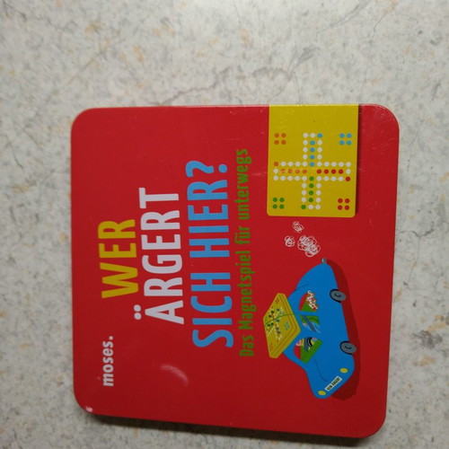 Travel board game in metal box like new