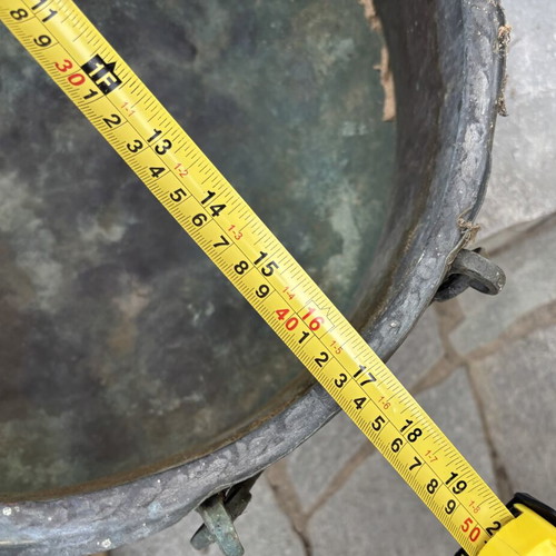 Vintage copper cauldron with hand-forged decoration used