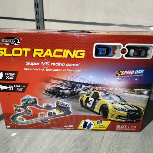 Slot racing track new with two cars in box case