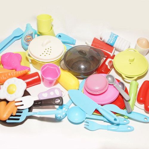 Cutting vegetables and kitchen toys used