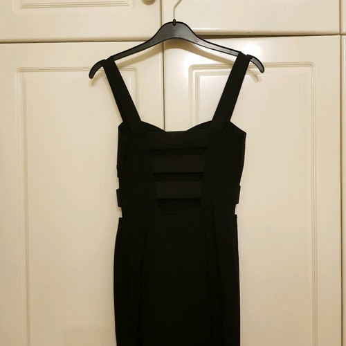 Mini black dress like new, elastic, size 36