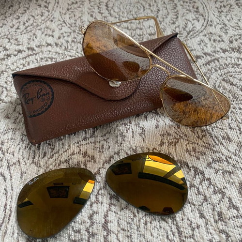 Ray-Ban sunglasses used with double gold-mirror lens