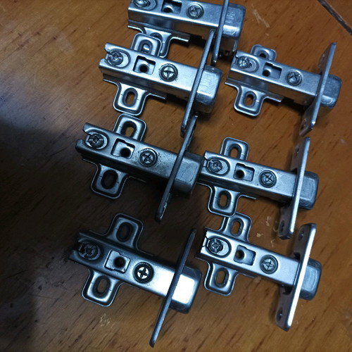 Cabinet hinges used, set of 7 pieces