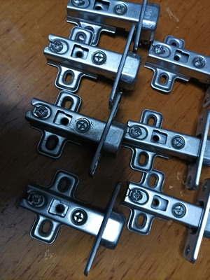 Cabinet hinges used, set of 7 pieces