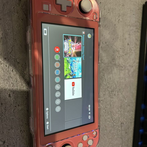 Nintendo Switch Lite κονσόλα σαν καινούργια με 4 παιχνίδια, 128GB αποθηκευτικό χώρο και θήκη