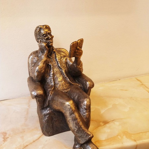 Sculpture of a Man Reading a Book, New