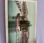 Leather-bound book with used Swiss Geneva postcard images