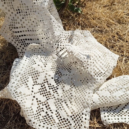 Handmade crochet lace embroidery, asymmetric design