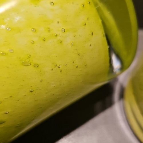 Set of 2 solid glass lime green candle holders