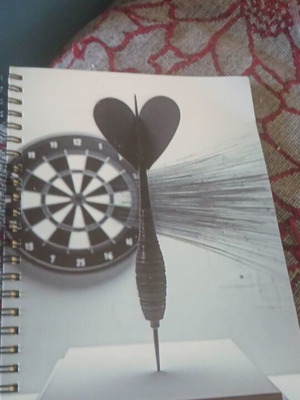 A5 notebook with dart design on cover