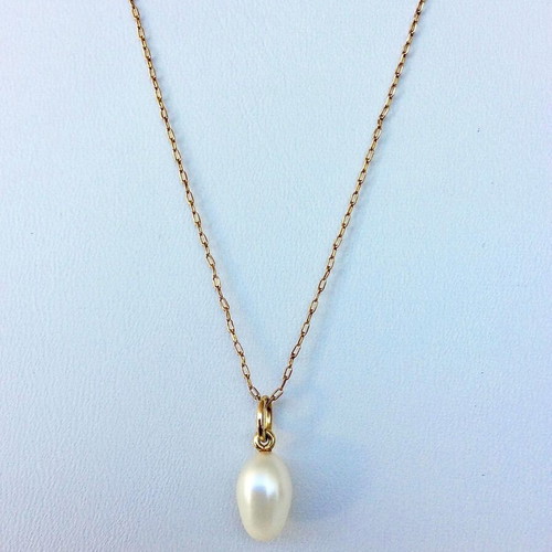 Oval Pearl Pendant like new with Gold-Plated Setting and Ring