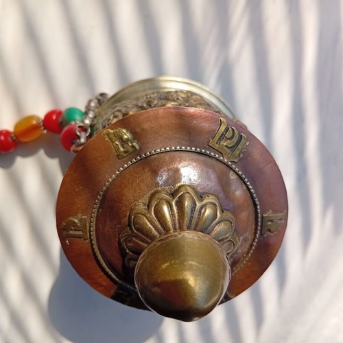 Tibetan prayer wheel used with original thin old paper