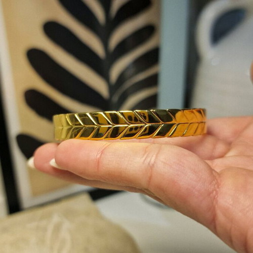 Cuff bracelet made of stainless steel new, gold color with embossed design