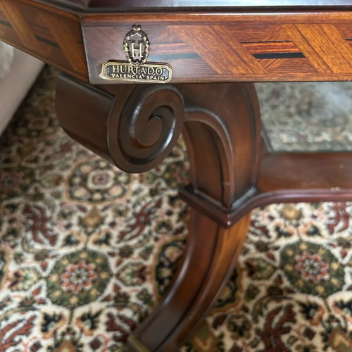 Coffee table like new walnut wood with brass lion legs and glass top