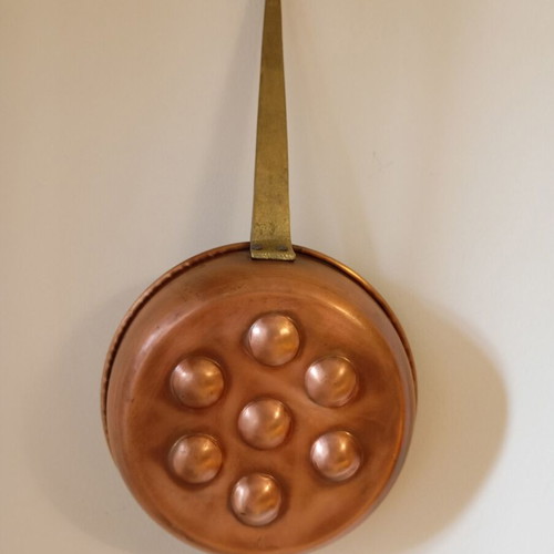 Vintage copper egg pan with 7 slots used
