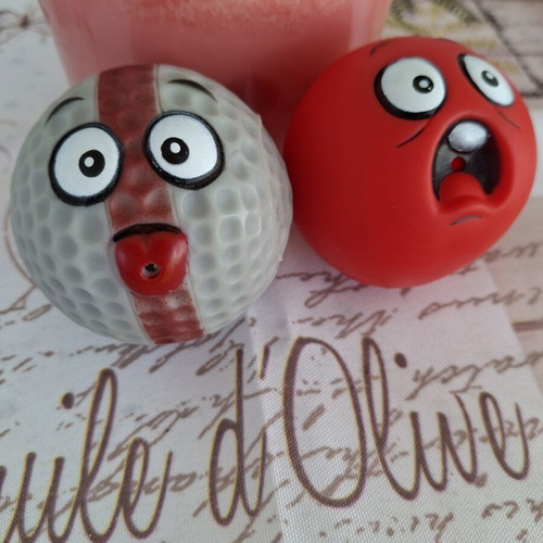 Set of 2 rubber squeaky balls with funny faces