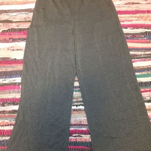 Glitter pants used, green and gold, with small hole