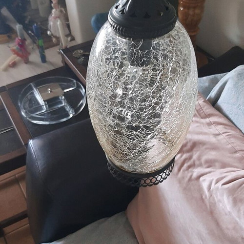 Lamp like new with blown glass and bronze metal