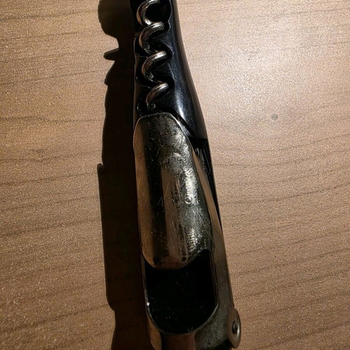 Vintage bottle opener in the shape of a wine bottle like new