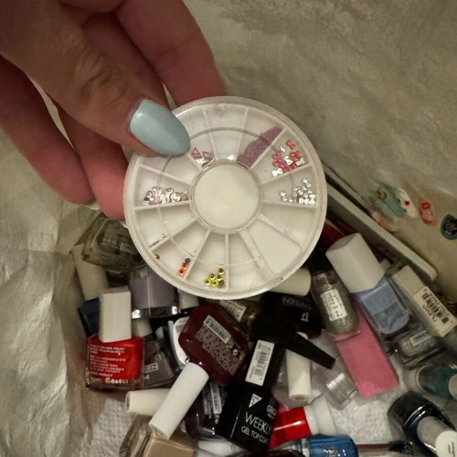 Various nail polishes and nail tools like new